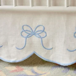 Bow Scalloped Crib Skirt in Soft Blue
