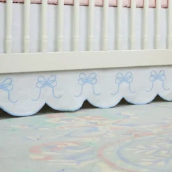 Bow Scalloped Crib Skirt in Soft Blue