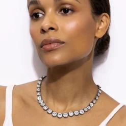 Catherine Round Rivière in White