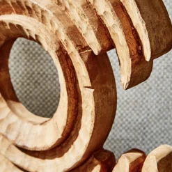 Hand-Carved Wood Sculpture on Black Stand