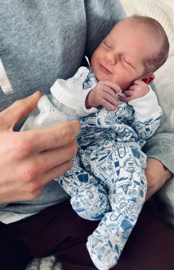 Nantucket Zip Baby Onesie in Sky Blue